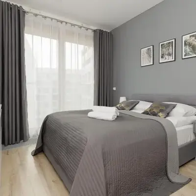 Cozy Apartments with Parking in the 19th District by Noclegi Renters